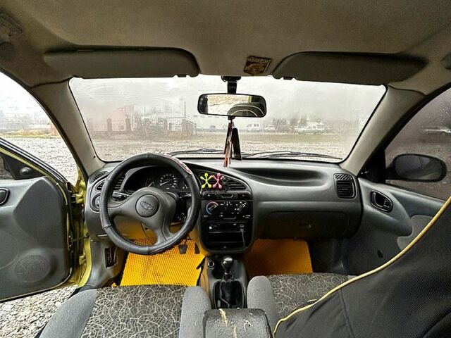 Жовтий Деу Ланос, об'ємом двигуна 1.5 л та пробігом 248 тис. км за 2700 $, фото 9 на Automoto.ua