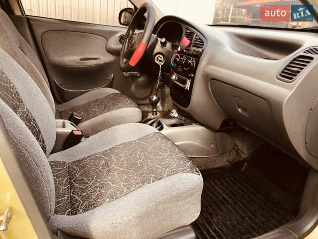 Жовтий Деу Ланос, об'ємом двигуна 1.39 л та пробігом 240 тис. км за 1700 $, фото 14 на Automoto.ua