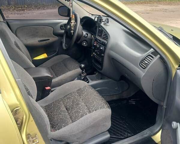 Жовтий Деу Ланос, об'ємом двигуна 1.5 л та пробігом 200 тис. км за 1100 $, фото 9 на Automoto.ua
