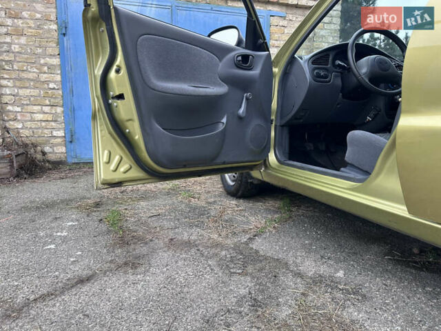 Жовтий Деу Ланос, об'ємом двигуна 1.4 л та пробігом 64 тис. км за 2550 $, фото 6 на Automoto.ua