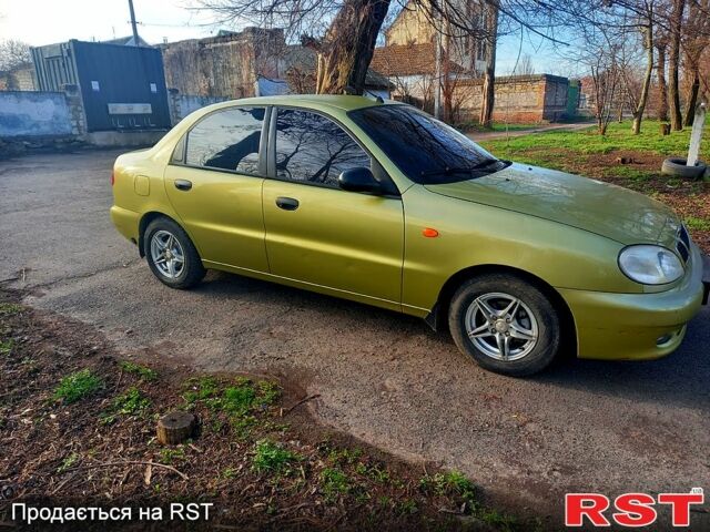 Желтый Дэу Ланос, объемом двигателя 1.4 л и пробегом 117 тыс. км за 2550 $, фото 9 на Automoto.ua