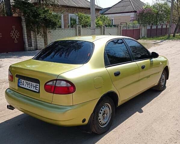 Желтый Дэу Ланос, объемом двигателя 1.5 л и пробегом 285 тыс. км за 2400 $, фото 3 на Automoto.ua