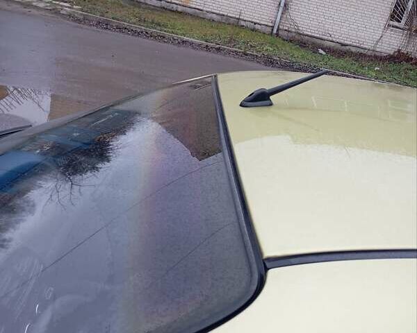 Желтый Дэу Ланос, объемом двигателя 1.39 л и пробегом 195 тыс. км за 2200 $, фото 9 на Automoto.ua