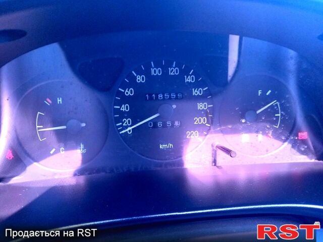 Жовтий Деу Ланос, об'ємом двигуна 1.4 л та пробігом 119 тис. км за 2450 $, фото 1 на Automoto.ua