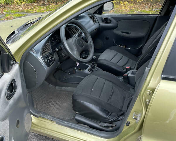 Желтый Дэу Ланос, объемом двигателя 1.5 л и пробегом 235 тыс. км за 1800 $, фото 11 на Automoto.ua