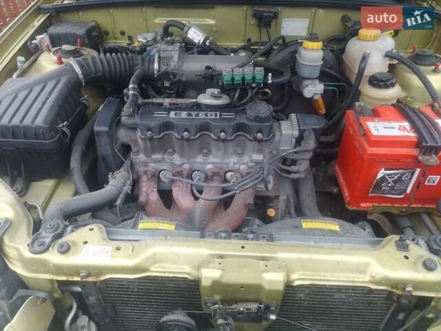 Желтый Дэу Ланос, объемом двигателя 1.5 л и пробегом 190 тыс. км за 1750 $, фото 10 на Automoto.ua