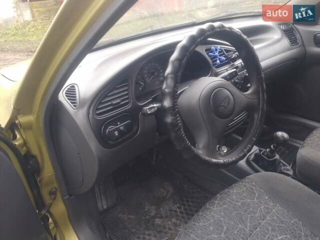 Желтый Дэу Ланос, объемом двигателя 1.5 л и пробегом 190 тыс. км за 1750 $, фото 22 на Automoto.ua