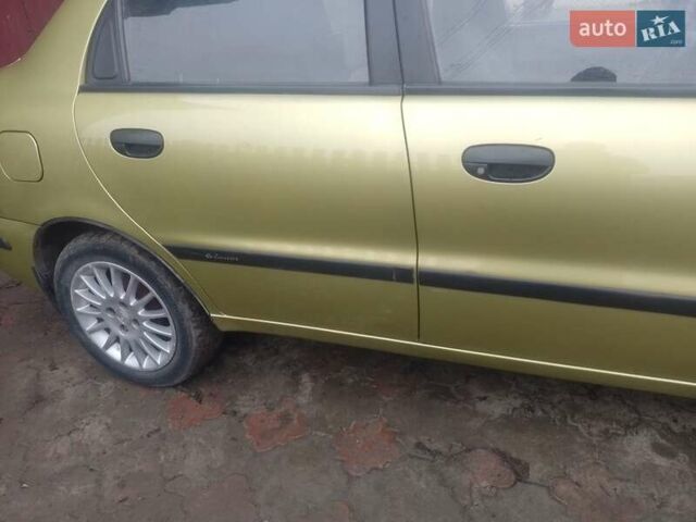 Желтый Дэу Ланос, объемом двигателя 1.5 л и пробегом 190 тыс. км за 1750 $, фото 7 на Automoto.ua