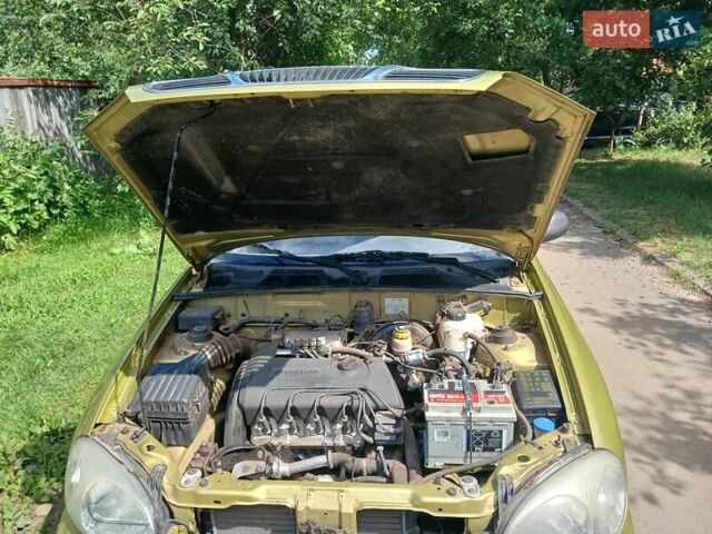 Желтый Дэу Ланос, объемом двигателя 1.39 л и пробегом 105 тыс. км за 2650 $, фото 2 на Automoto.ua