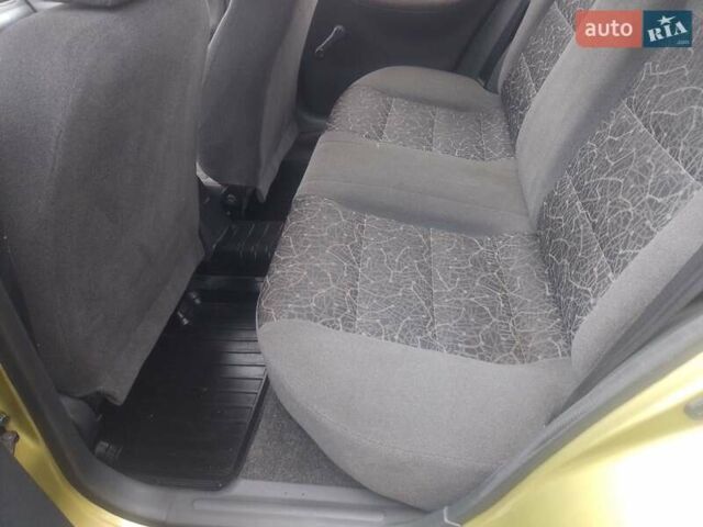 Желтый Дэу Ланос, объемом двигателя 1.5 л и пробегом 190 тыс. км за 1750 $, фото 25 на Automoto.ua