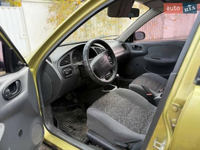 Жовтий Деу Ланос, об'ємом двигуна 1.5 л та пробігом 200 тис. км за 1500 $, фото 1 на Automoto.ua