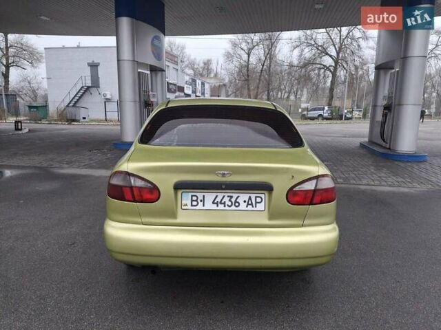 Желтый Дэу Ланос, объемом двигателя 1.49 л и пробегом 200 тыс. км за 1650 $, фото 2 на Automoto.ua