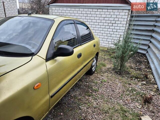 Желтый Дэу Ланос, объемом двигателя 1.5 л и пробегом 130 тыс. км за 2300 $, фото 1 на Automoto.ua