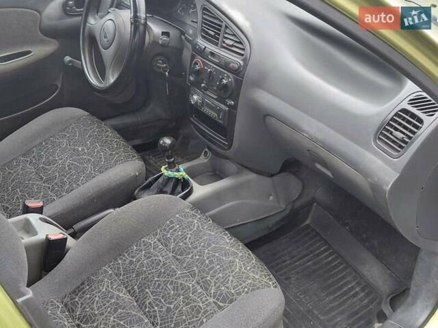 Желтый Дэу Ланос, объемом двигателя 1.5 л и пробегом 250 тыс. км за 1700 $, фото 3 на Automoto.ua