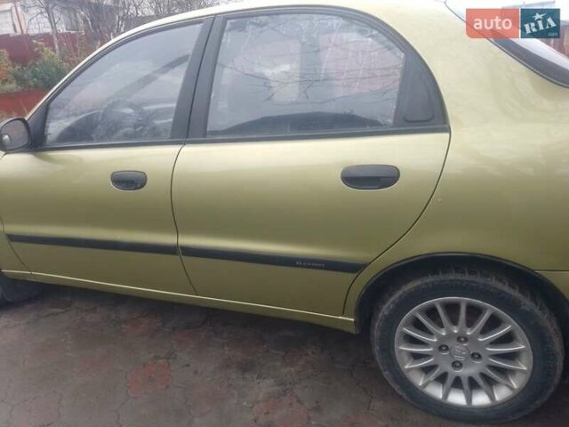 Желтый Дэу Ланос, объемом двигателя 1.5 л и пробегом 190 тыс. км за 1750 $, фото 4 на Automoto.ua