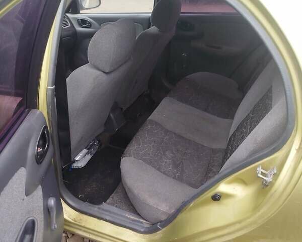 Желтый Дэу Ланос, объемом двигателя 1.5 л и пробегом 200 тыс. км за 1300 $, фото 6 на Automoto.ua