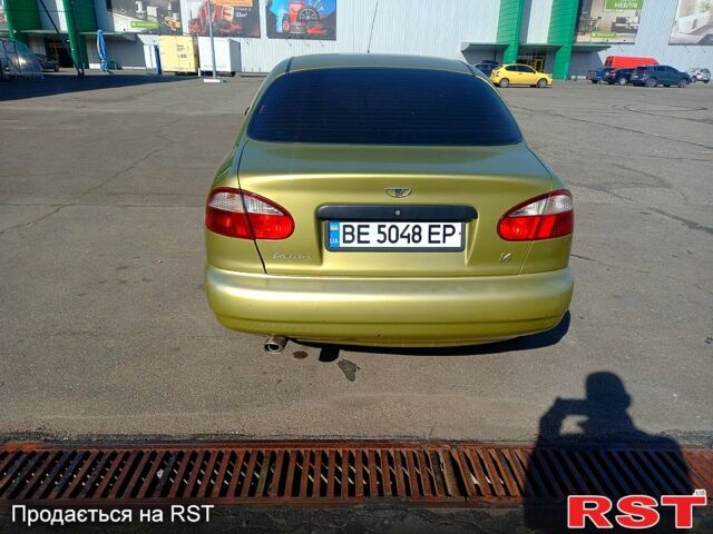 Желтый Дэу Ланос, объемом двигателя 1.4 л и пробегом 117 тыс. км за 2550 $, фото 8 на Automoto.ua