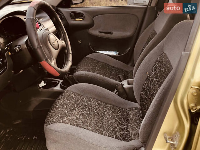 Жовтий Деу Ланос, об'ємом двигуна 1.39 л та пробігом 240 тис. км за 1700 $, фото 23 на Automoto.ua