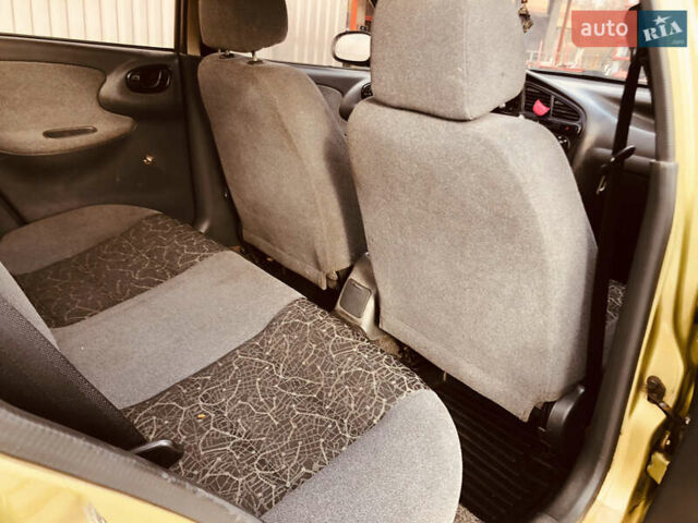 Жовтий Деу Ланос, об'ємом двигуна 1.39 л та пробігом 240 тис. км за 1700 $, фото 20 на Automoto.ua