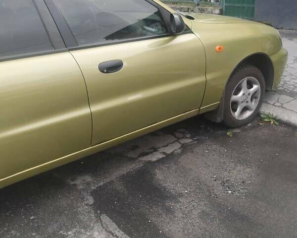Желтый Дэу Ланос, объемом двигателя 1.5 л и пробегом 235 тыс. км за 2000 $, фото 7 на Automoto.ua