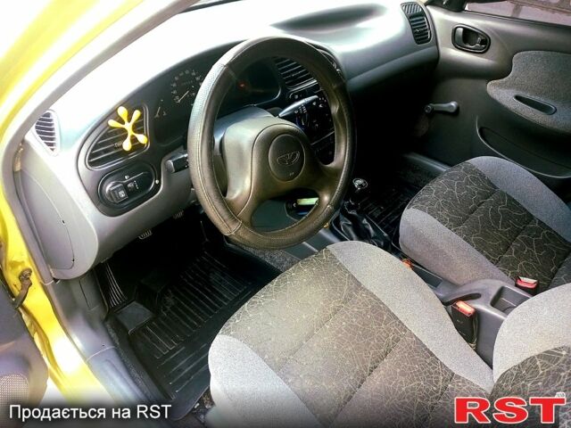 Жовтий Деу Ланос, об'ємом двигуна 1.4 л та пробігом 119 тис. км за 2450 $, фото 10 на Automoto.ua