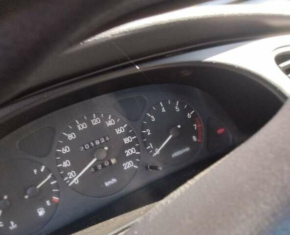 Желтый Дэу Ланос, объемом двигателя 1.5 л и пробегом 202 тыс. км за 1500 $, фото 2 на Automoto.ua