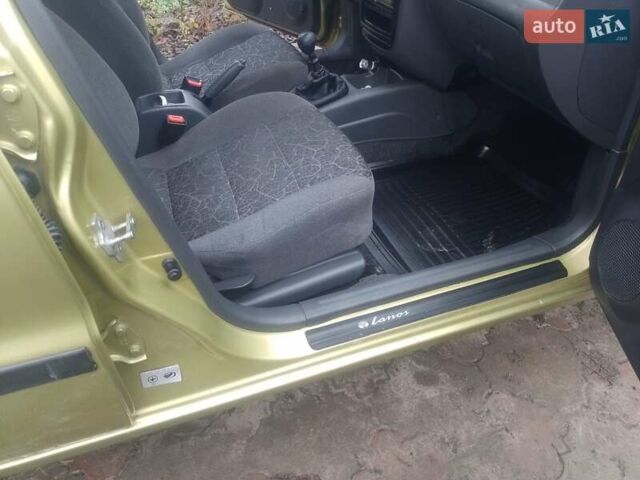 Желтый Дэу Ланос, объемом двигателя 1.5 л и пробегом 190 тыс. км за 1750 $, фото 14 на Automoto.ua