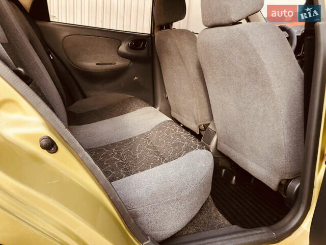 Жовтий Деу Ланос, об'ємом двигуна 1.39 л та пробігом 240 тис. км за 1700 $, фото 19 на Automoto.ua