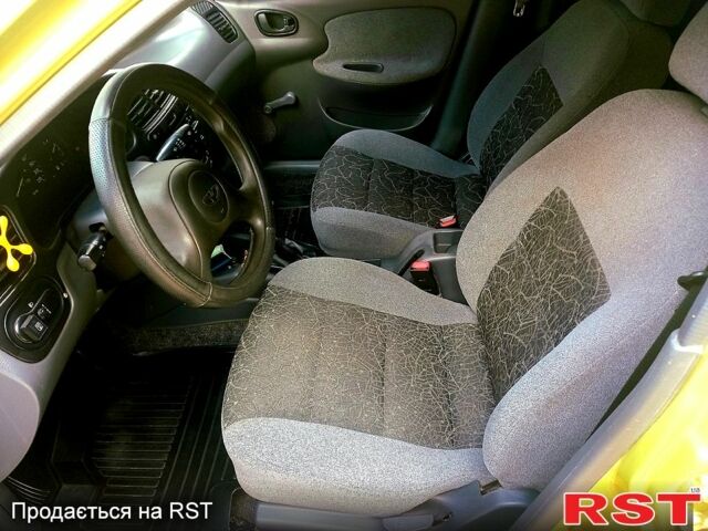 Жовтий Деу Ланос, об'ємом двигуна 1.4 л та пробігом 119 тис. км за 2450 $, фото 9 на Automoto.ua