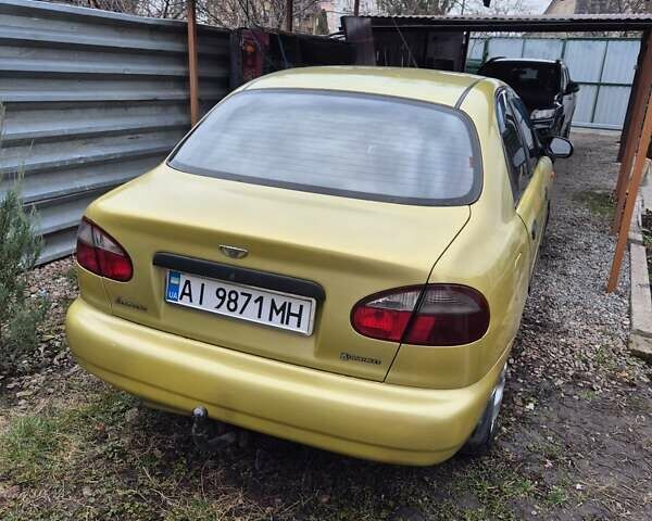 Желтый Дэу Ланос, объемом двигателя 1.5 л и пробегом 130 тыс. км за 2300 $, фото 7 на Automoto.ua