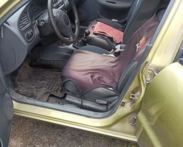 Жовтий Деу Ланос, об'ємом двигуна 1.4 л та пробігом 59 тис. км за 2000 $, фото 8 на Automoto.ua