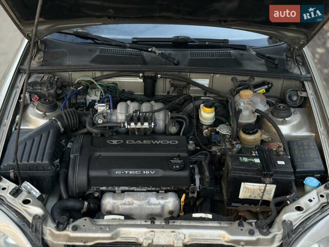 Желтый Дэу Ланос, объемом двигателя 1.6 л и пробегом 115 тыс. км за 2750 $, фото 12 на Automoto.ua