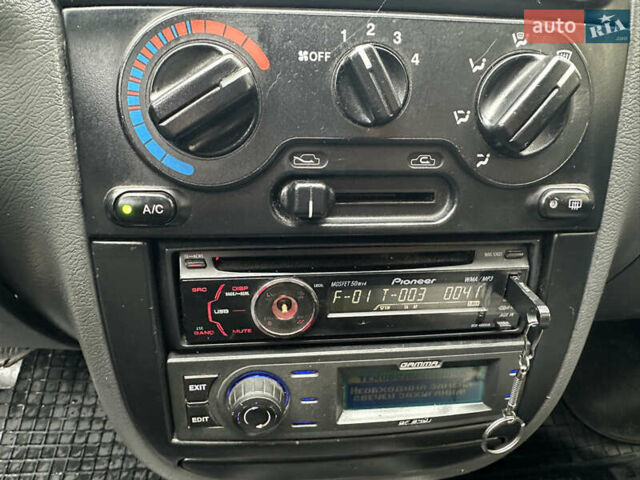 Желтый Дэу Ланос, объемом двигателя 1.5 л и пробегом 223 тыс. км за 1499 $, фото 12 на Automoto.ua