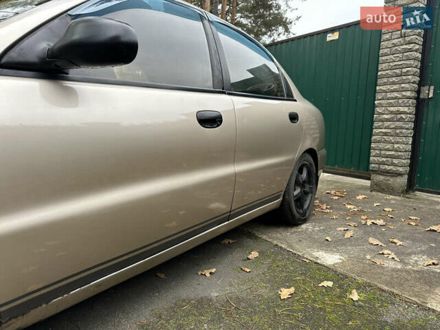 Желтый Дэу Ланос, объемом двигателя 1.5 л и пробегом 223 тыс. км за 1499 $, фото 16 на Automoto.ua