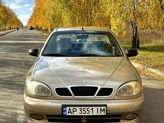 Желтый Дэу Ланос, объемом двигателя 1.5 л и пробегом 165 тыс. км за 1599 $, фото 3 на Automoto.ua