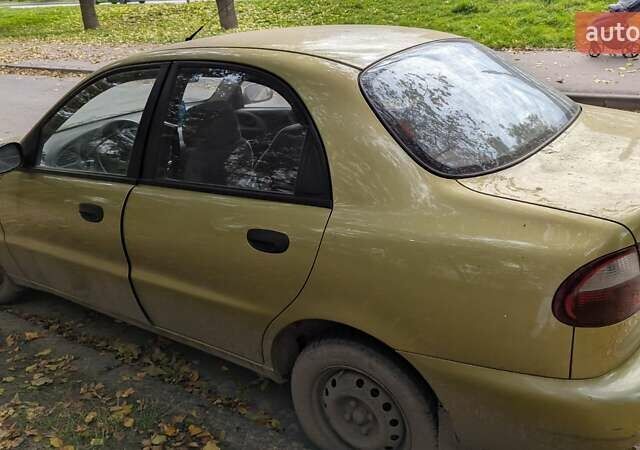 Желтый Дэу Ланос, объемом двигателя 1.5 л и пробегом 122 тыс. км за 2300 $, фото 2 на Automoto.ua