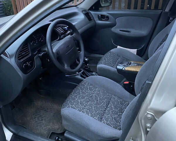 Жовтий Деу Ланос, об'ємом двигуна 1.6 л та пробігом 185 тис. км за 3000 $, фото 4 на Automoto.ua