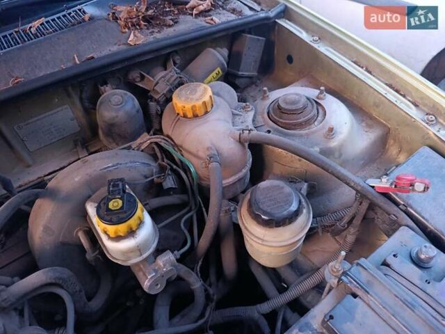 Желтый Дэу Ланос, объемом двигателя 1.6 л и пробегом 137 тыс. км за 1500 $, фото 12 на Automoto.ua
