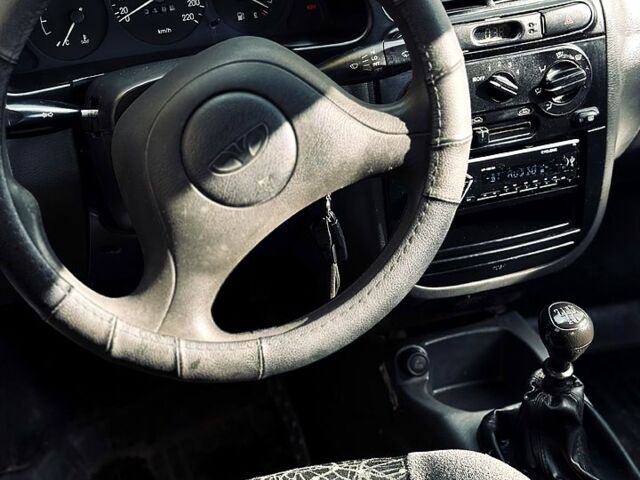 Желтый Дэу Ланос, объемом двигателя 1.5 л и пробегом 165 тыс. км за 1599 $, фото 11 на Automoto.ua