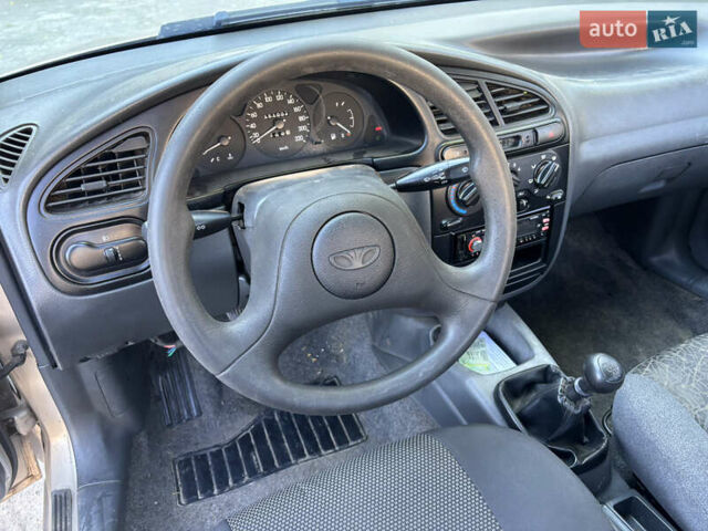 Желтый Дэу Ланос, объемом двигателя 1.4 л и пробегом 150 тыс. км за 1100 $, фото 11 на Automoto.ua