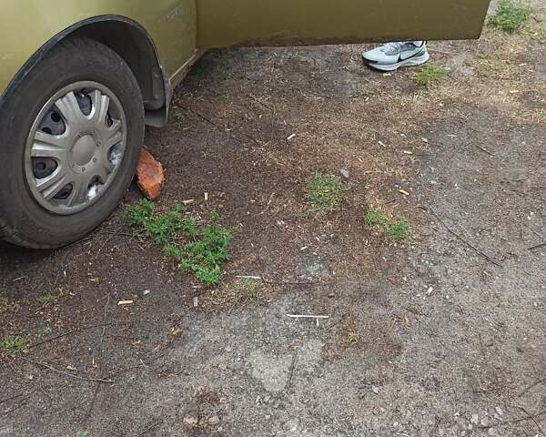 Жовтий Деу Ланос, об'ємом двигуна 1.4 л та пробігом 59 тис. км за 2000 $, фото 3 на Automoto.ua