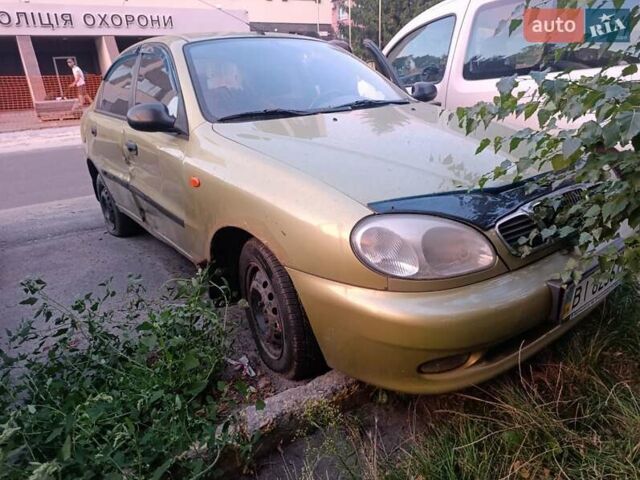 Желтый Дэу Ланос, объемом двигателя 1.6 л и пробегом 137 тыс. км за 1500 $, фото 7 на Automoto.ua