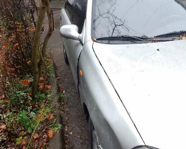 Серый Дэу Ланос, объемом двигателя 1.5 л и пробегом 300 тыс. км за 850 $, фото 2 на Automoto.ua