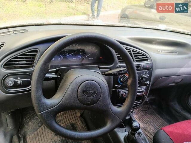 Сірий Деу Ланос, об'ємом двигуна 1.5 л та пробігом 227 тис. км за 1200 $, фото 4 на Automoto.ua
