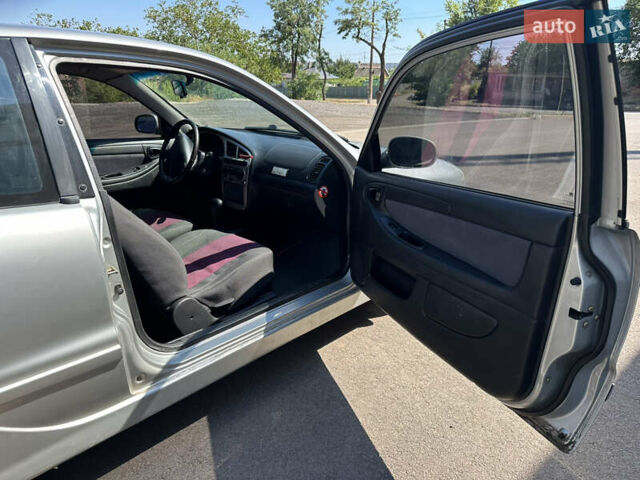 Дэу Ланос 2003 в Кривом Роге на Automoto.ua Серый Дэу Ланос, объемом двигателя 1.6 л и пробегом 237 тыс. км за 3150 $, фото 7 на Automoto.ua