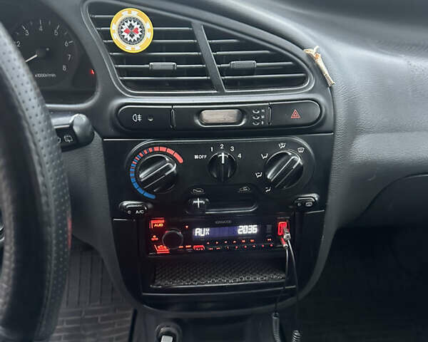 Серый Дэу Ланос, объемом двигателя 1.5 л и пробегом 210 тыс. км за 2200 $, фото 18 на Automoto.ua