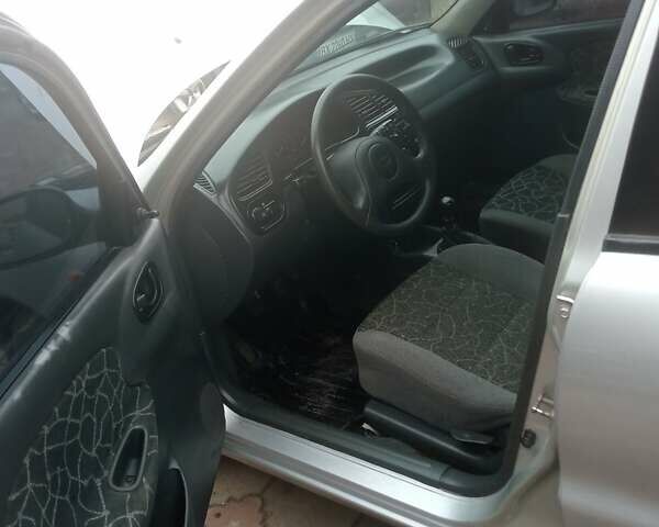 Серый Дэу Ланос, объемом двигателя 1.5 л и пробегом 300 тыс. км за 2000 $, фото 6 на Automoto.ua