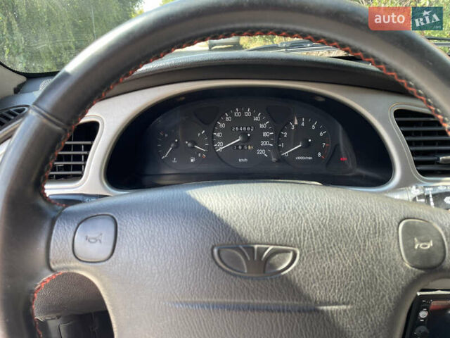Серый Дэу Ланос, объемом двигателя 1.6 л и пробегом 255 тыс. км за 2999 $, фото 2 на Automoto.ua