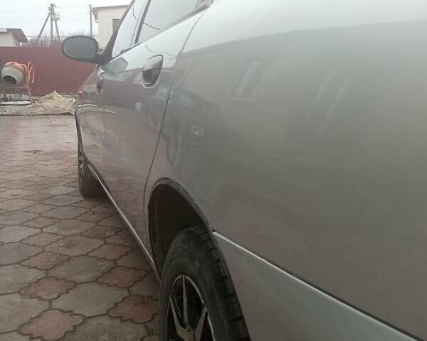 Серый Дэу Ланос, объемом двигателя 1.5 л и пробегом 300 тыс. км за 2000 $, фото 10 на Automoto.ua