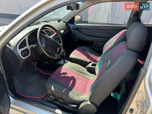 Дэу Ланос 2003 в Кривом Роге на Automoto.ua Серый Дэу Ланос, объемом двигателя 1.6 л и пробегом 237 тыс. км за 3150 $, фото 11 на Automoto.ua